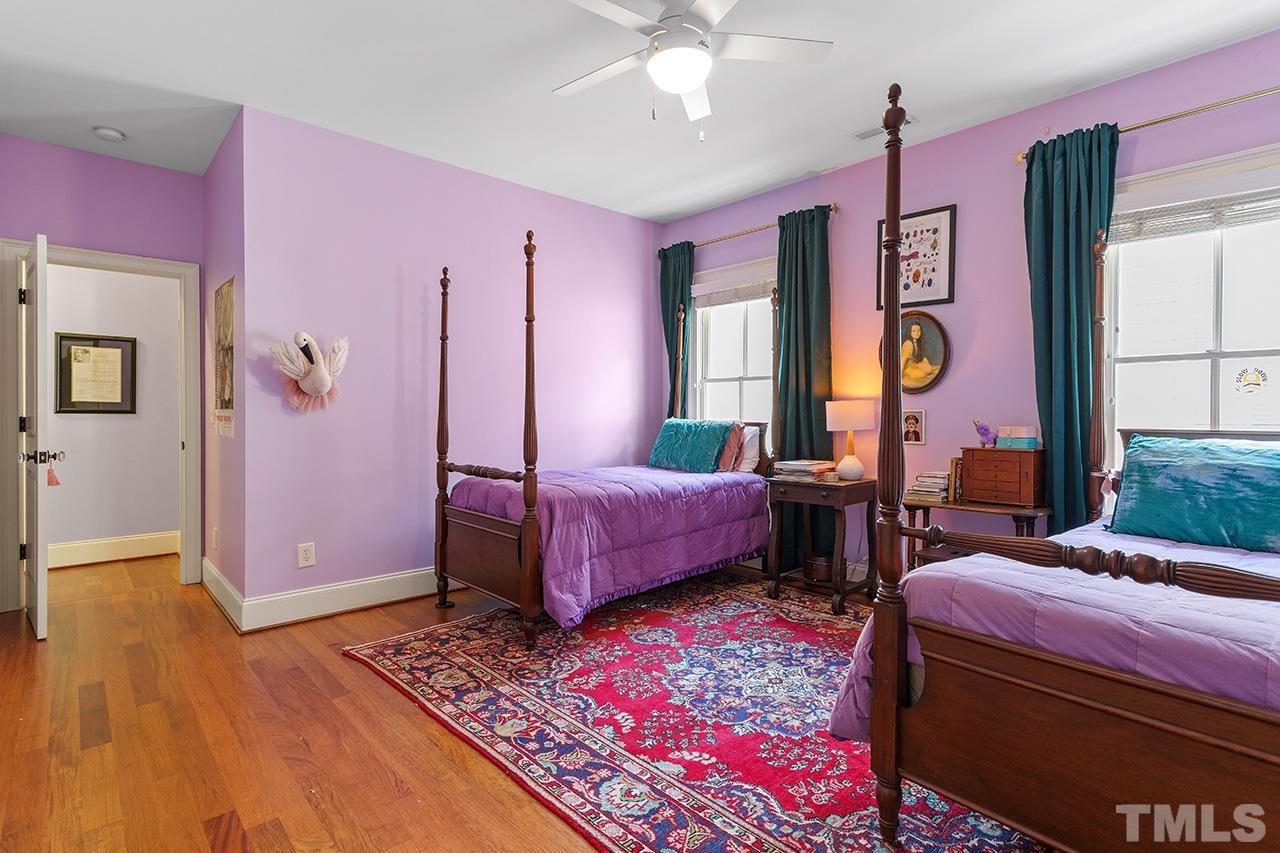 3100 Raymond Street Raleigh, NC 27607 - Photo 26 of 37 a bedroom with a bed dresser and a window