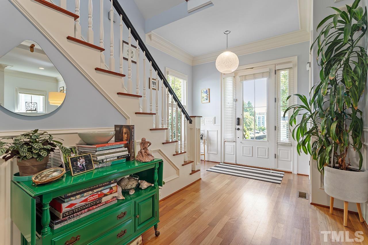 3100 Raymond Street Raleigh, NC 27607 - Photo 4 of 37 a view of an entryway with wooden floor and a potted plant