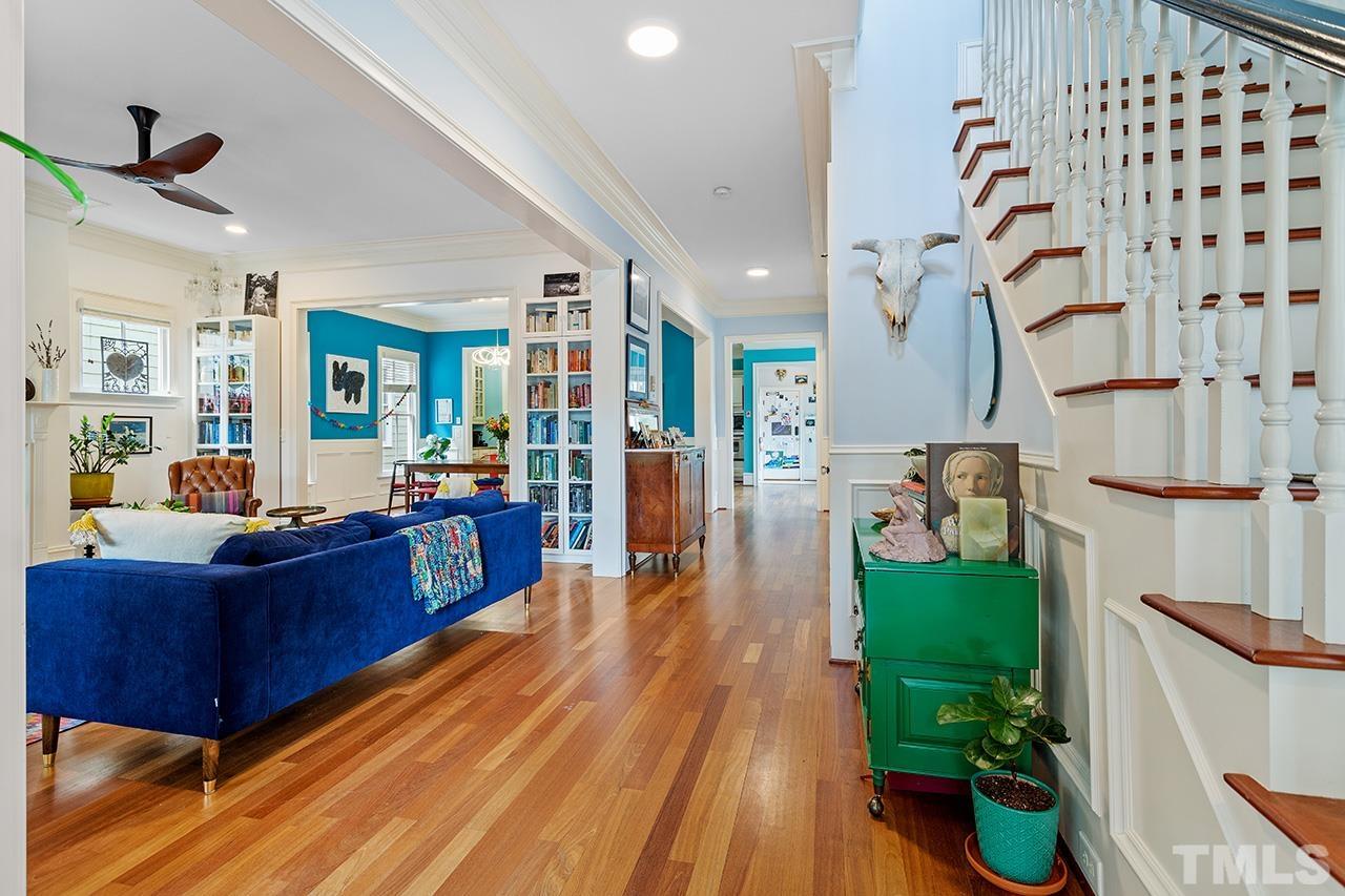 3100 Raymond Street Raleigh, NC 27607 - Photo 5 of 37 a living room with furniture and a wooden floor