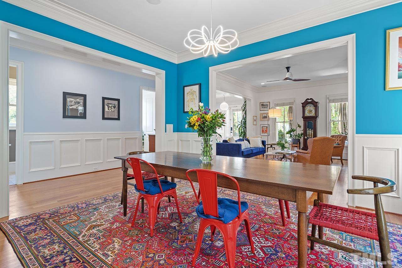 3100 Raymond Street Raleigh, NC 27607 - Photo 10 of 37 a view of a dining room with furniture and wooden floor