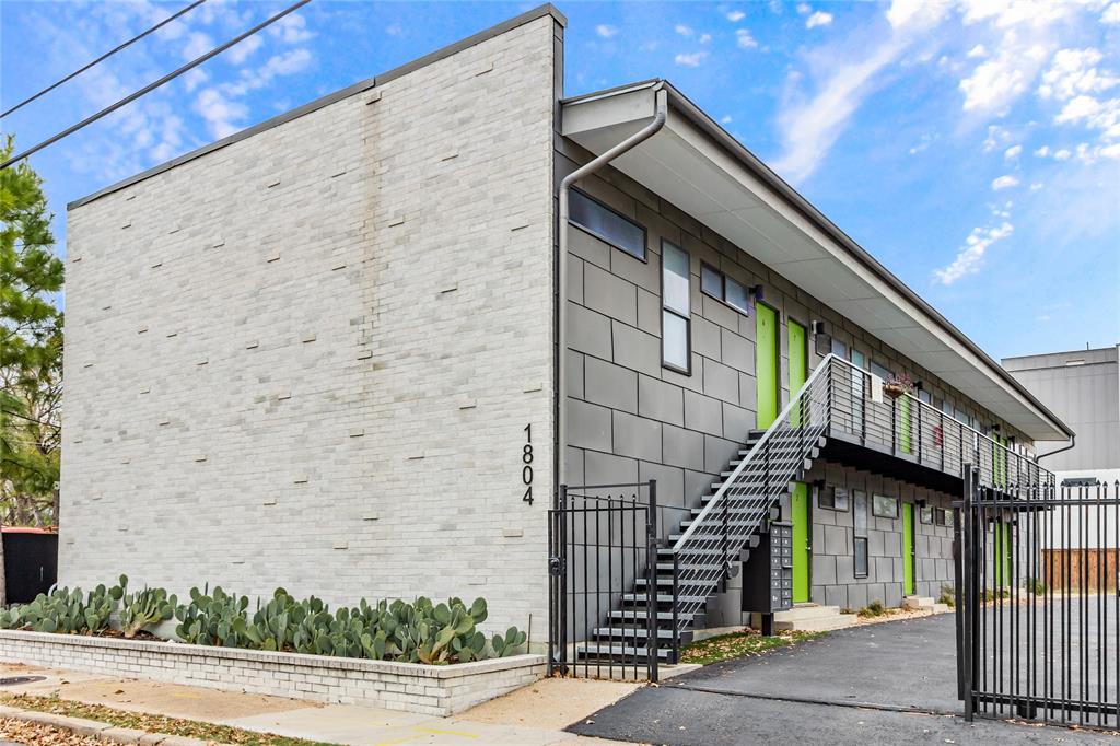 1804 Gould Street, Unit 9 Dallas, TX 75215 - Photo 11 of 12 a front view of a house with stairs