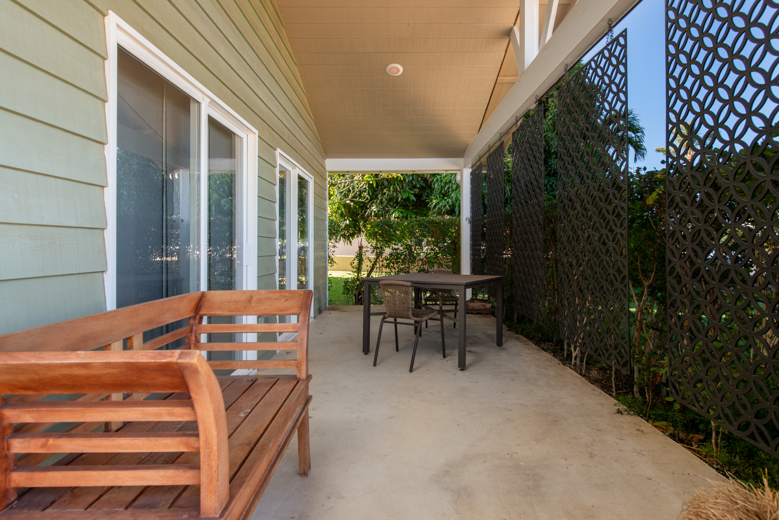 68-1655 Alana Street Waikoloa, HI 96738 - Photo 19 of 20 a backyard of a house with table and chairs