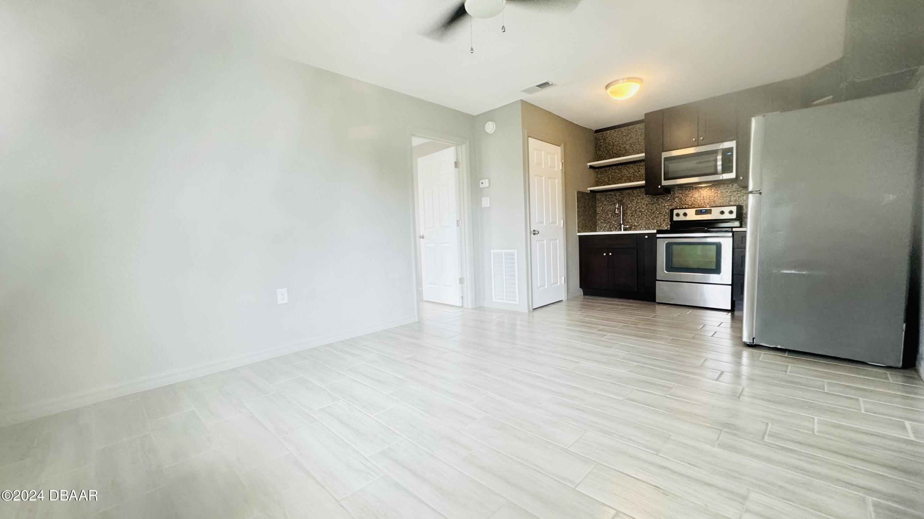 71 Rockefeller Drive, Unit A Ormond Beach, FL 32176 - Photo 12 of 21 IMG_1038
