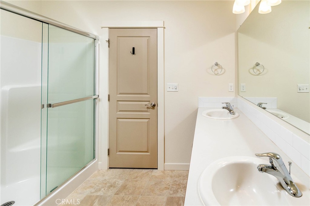 3667 Southwest Pumice Stone Avenue Redmond, OR 97756 - Photo 10 of 13 a bathroom with a sink and a tub