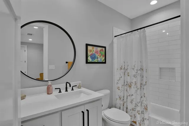 a bed room with a bed and a couch