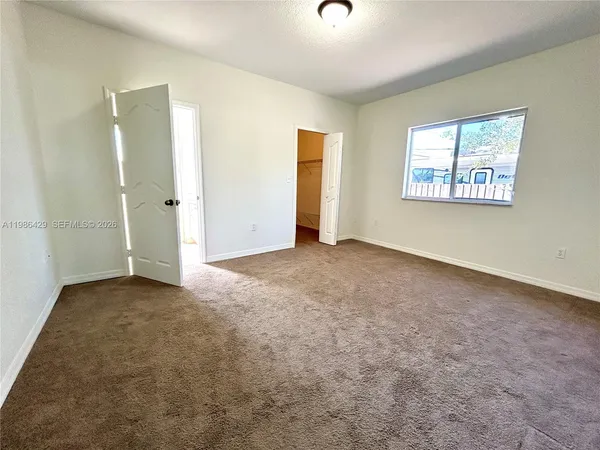 an empty room with windows