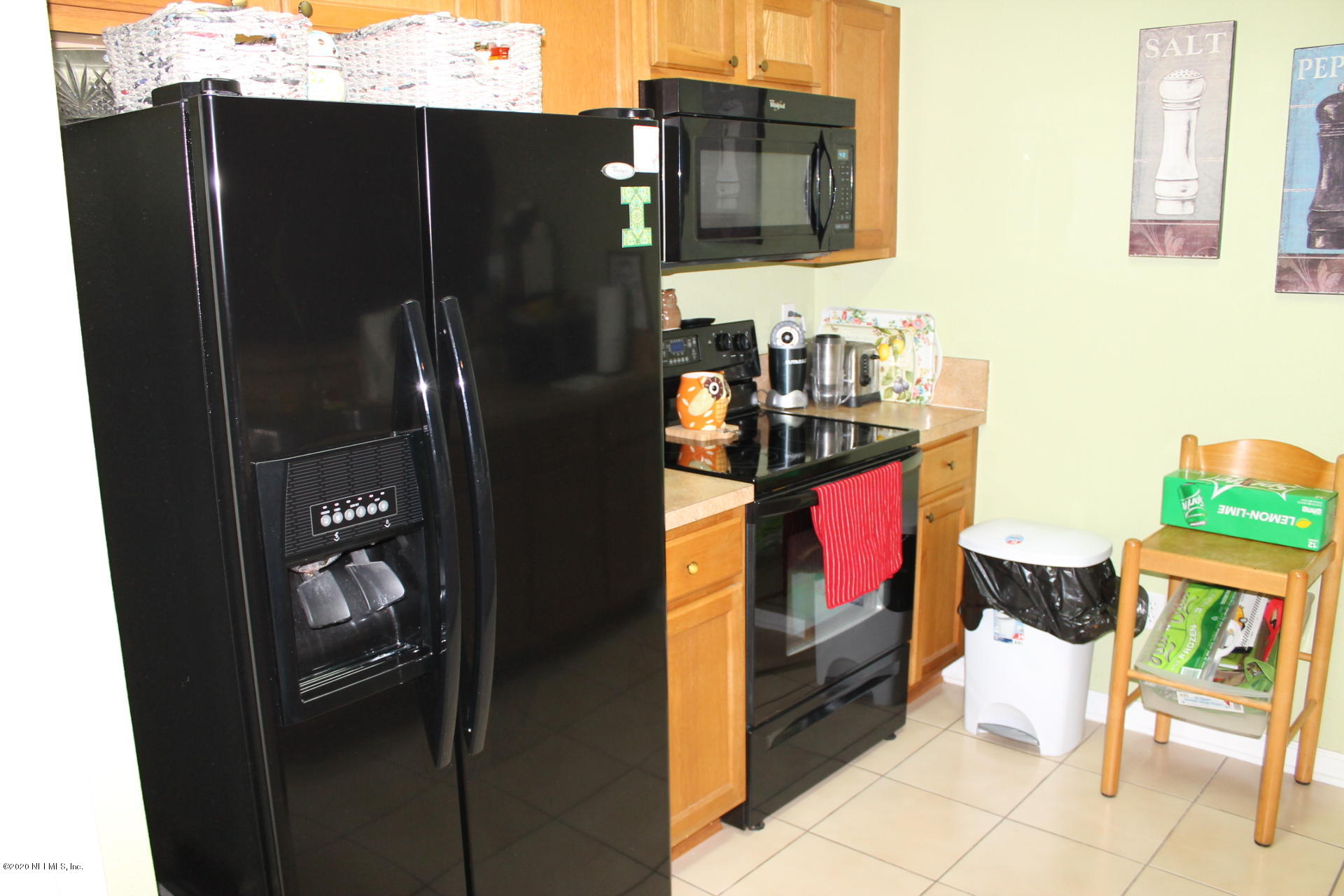 3680 Kirkpatrick Circle, Unit 3 Jacksonville, FL 32210 - Photo 15 of 29 a bathroom with a sink and a mirror