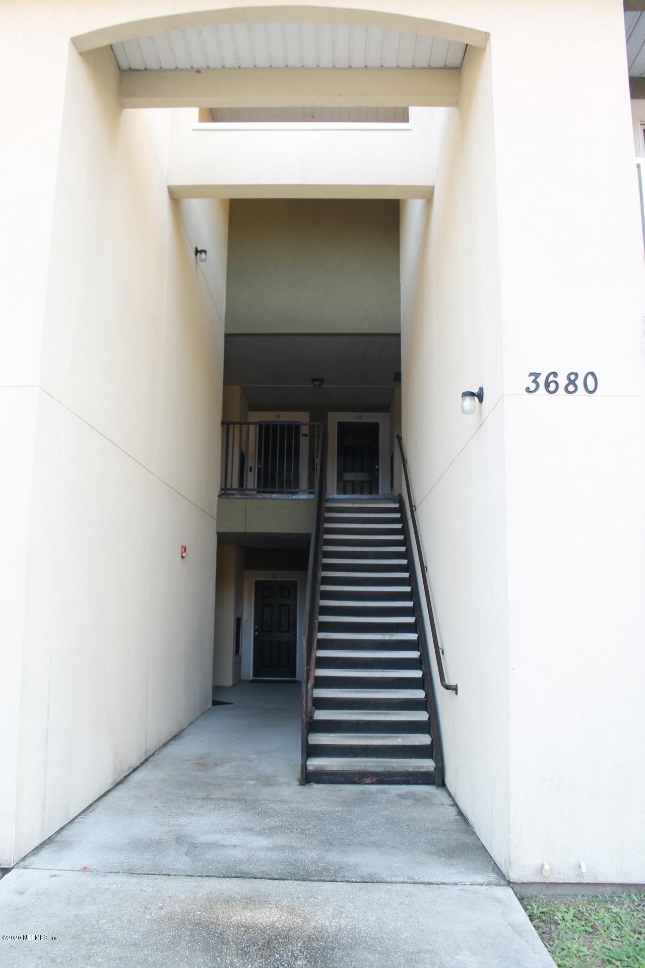 3680 Kirkpatrick Circle, Unit 3 Jacksonville, FL 32210 - Photo 2 of 29 a view of a hallway with entryway and hall
