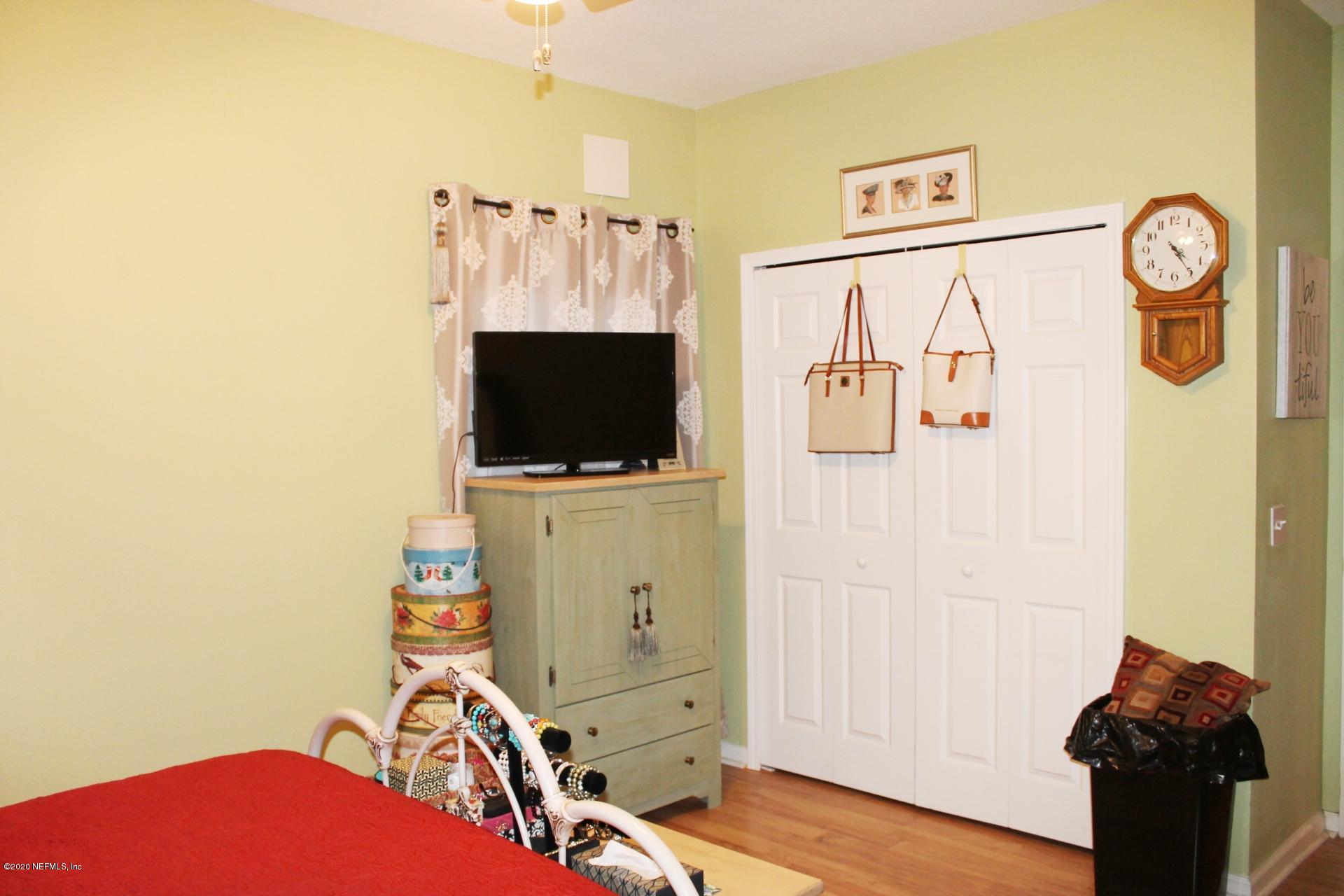 3680 Kirkpatrick Circle, Unit 3 Jacksonville, FL 32210 - Photo 23 of 29 a view of a storage & utility room with wooden floor