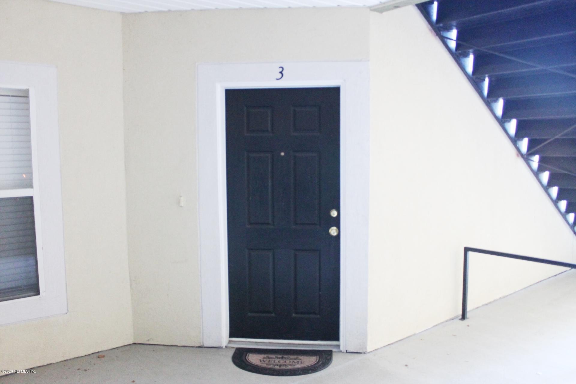 3680 Kirkpatrick Circle, Unit 3 Jacksonville, FL 32210 - Photo 28 of 29 a bathroom with a shower and a sink