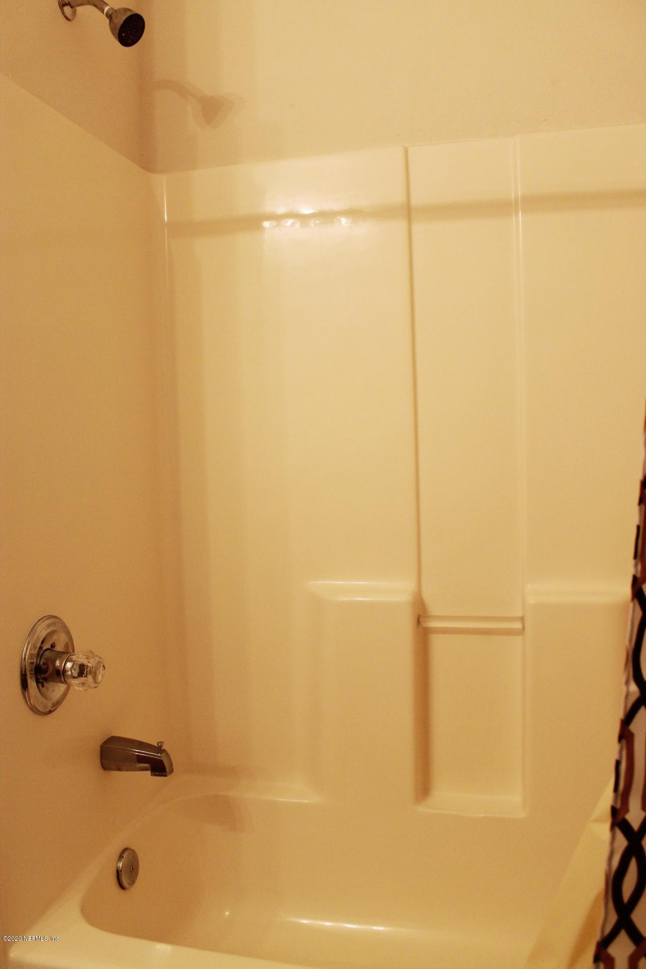 3680 Kirkpatrick Circle, Unit 3 Jacksonville, FL 32210 - Photo 10 of 29 a bathroom with a shower