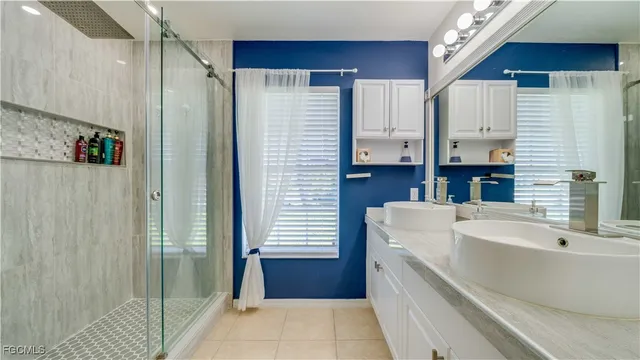 a bathroom with a bathtub and a sink
