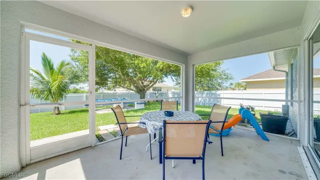 a dining room with furniture garden and wooden floor