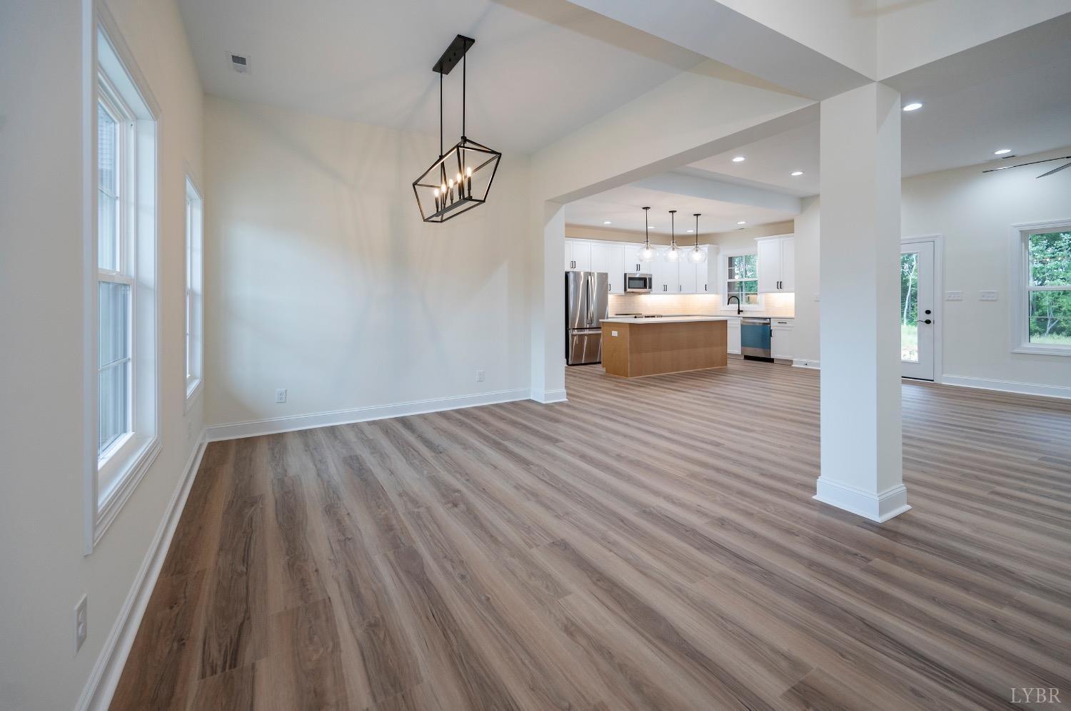 1738 Willow Oak Drive Forest, VA 24551 - Photo 2 of 54 a view of a room with wooden floors and windows
