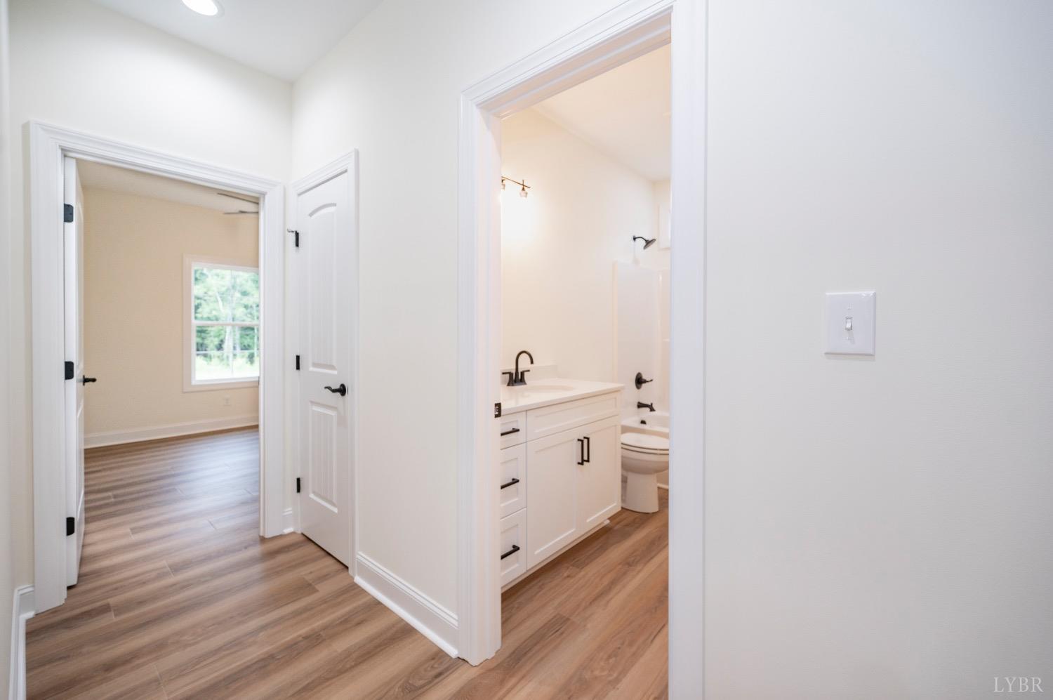 1738 Willow Oak Drive Forest, VA 24551 - Photo 44 of 54 a view of a hallway with wooden floor