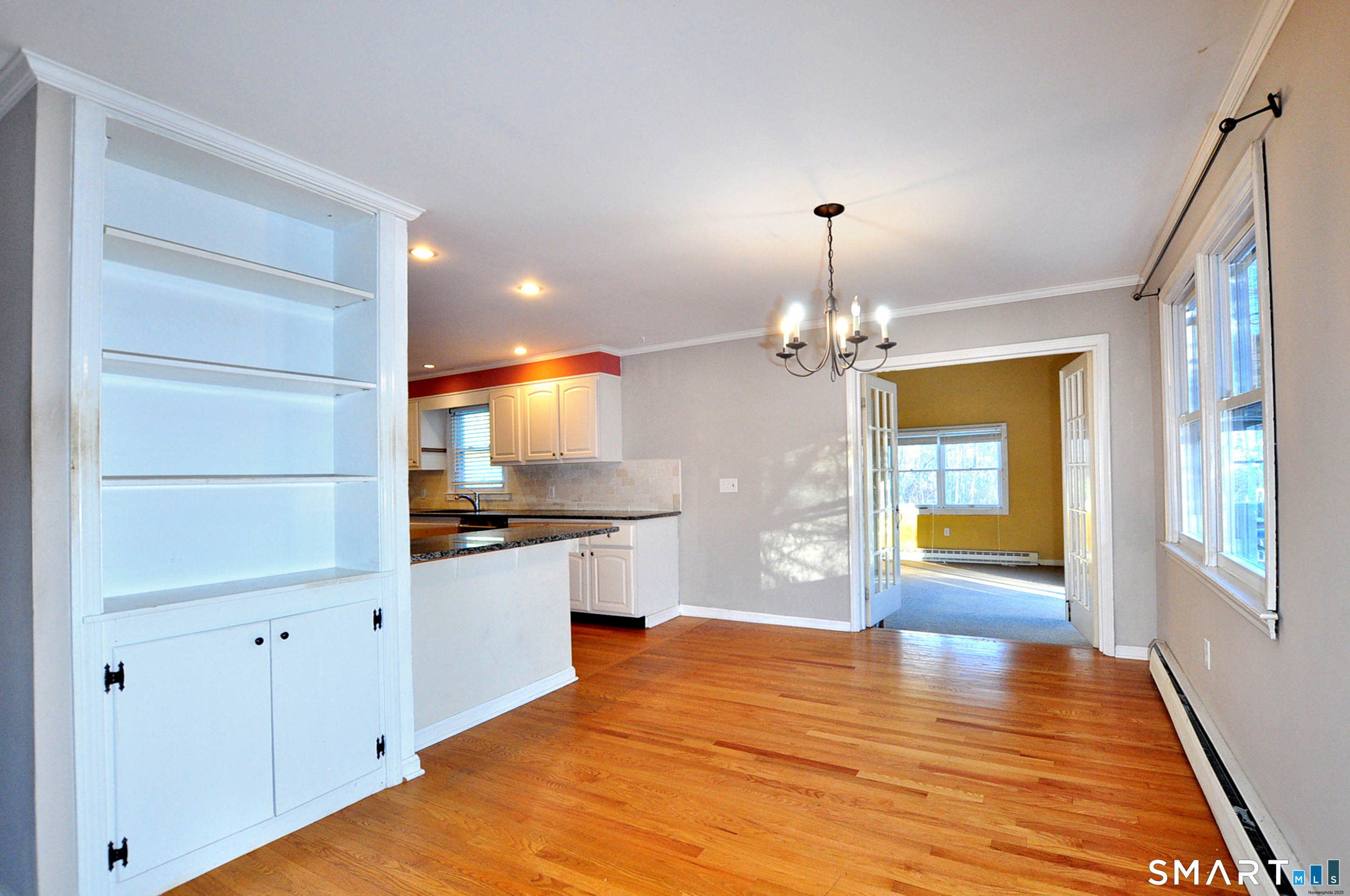 204 Goodhouse Road Litchfield, CT 06759 - Photo 13 of 37 a kitchen with stainless steel appliances granite countertop a stove cabinets and wooden floor