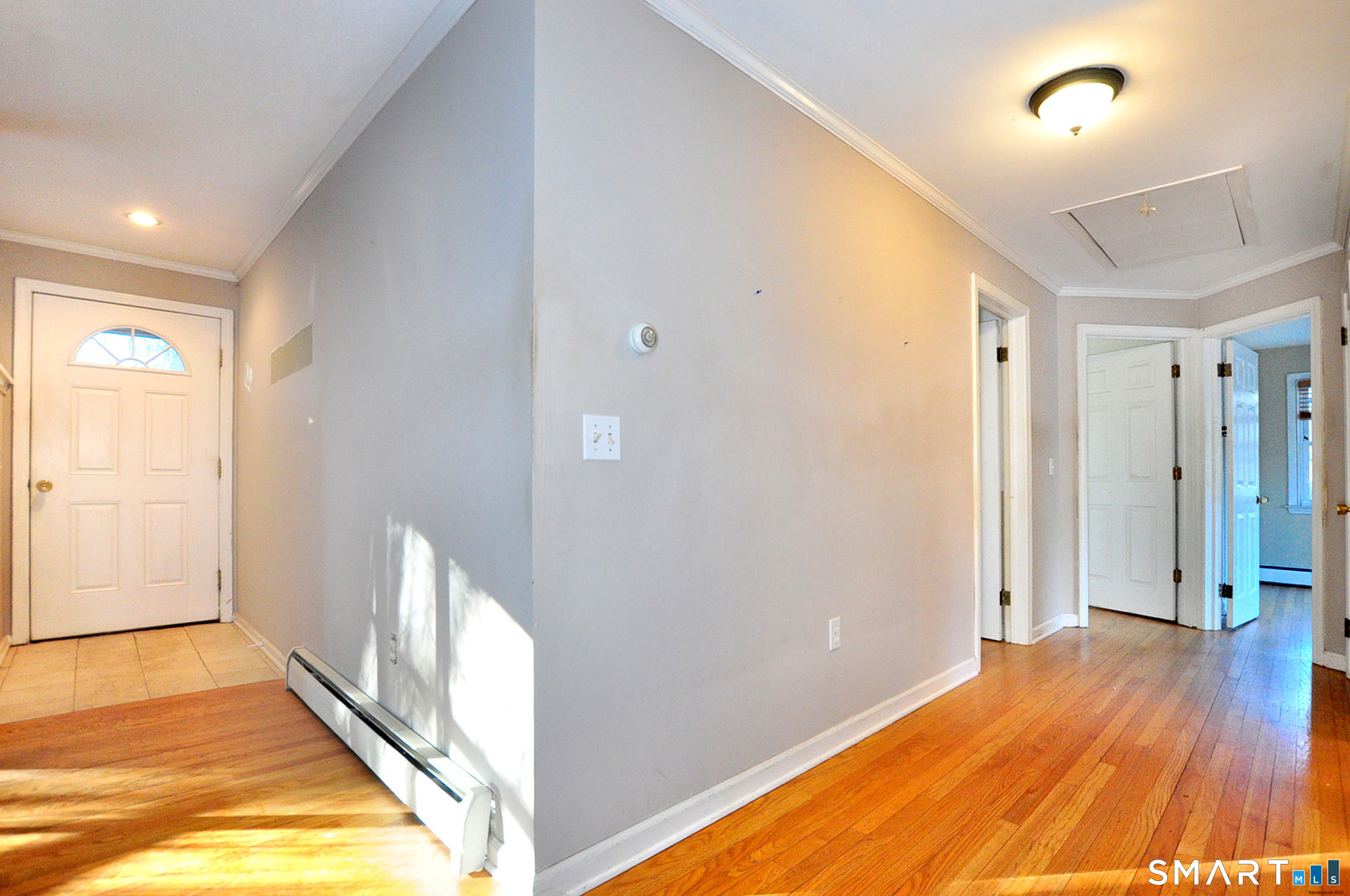 204 Goodhouse Road Litchfield, CT 06759 - Photo 22 of 37 a view of an empty room with wooden floor