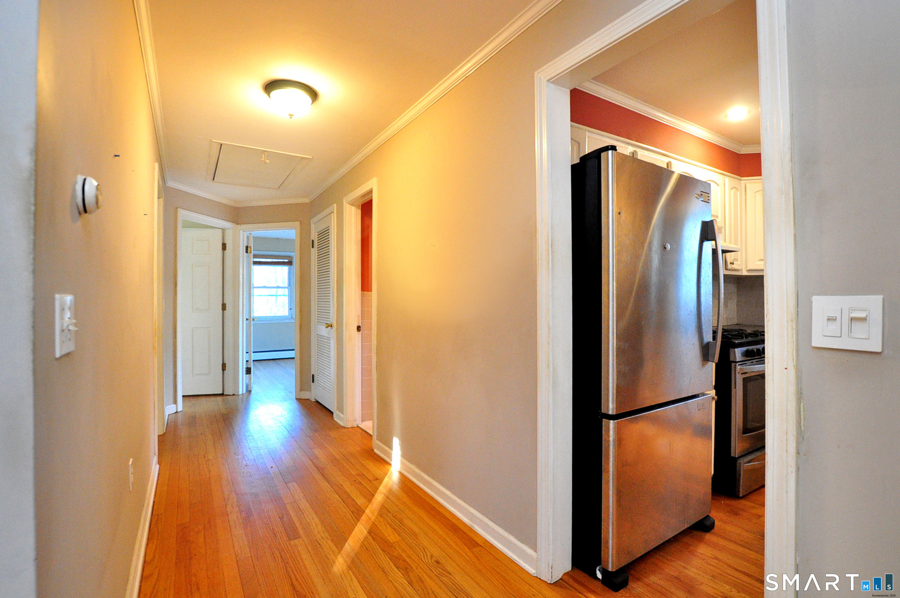 204 Goodhouse Road Litchfield, CT 06759 - Photo 23 of 37 a view of a hallway with wooden floor