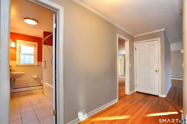 a view of an empty room and window