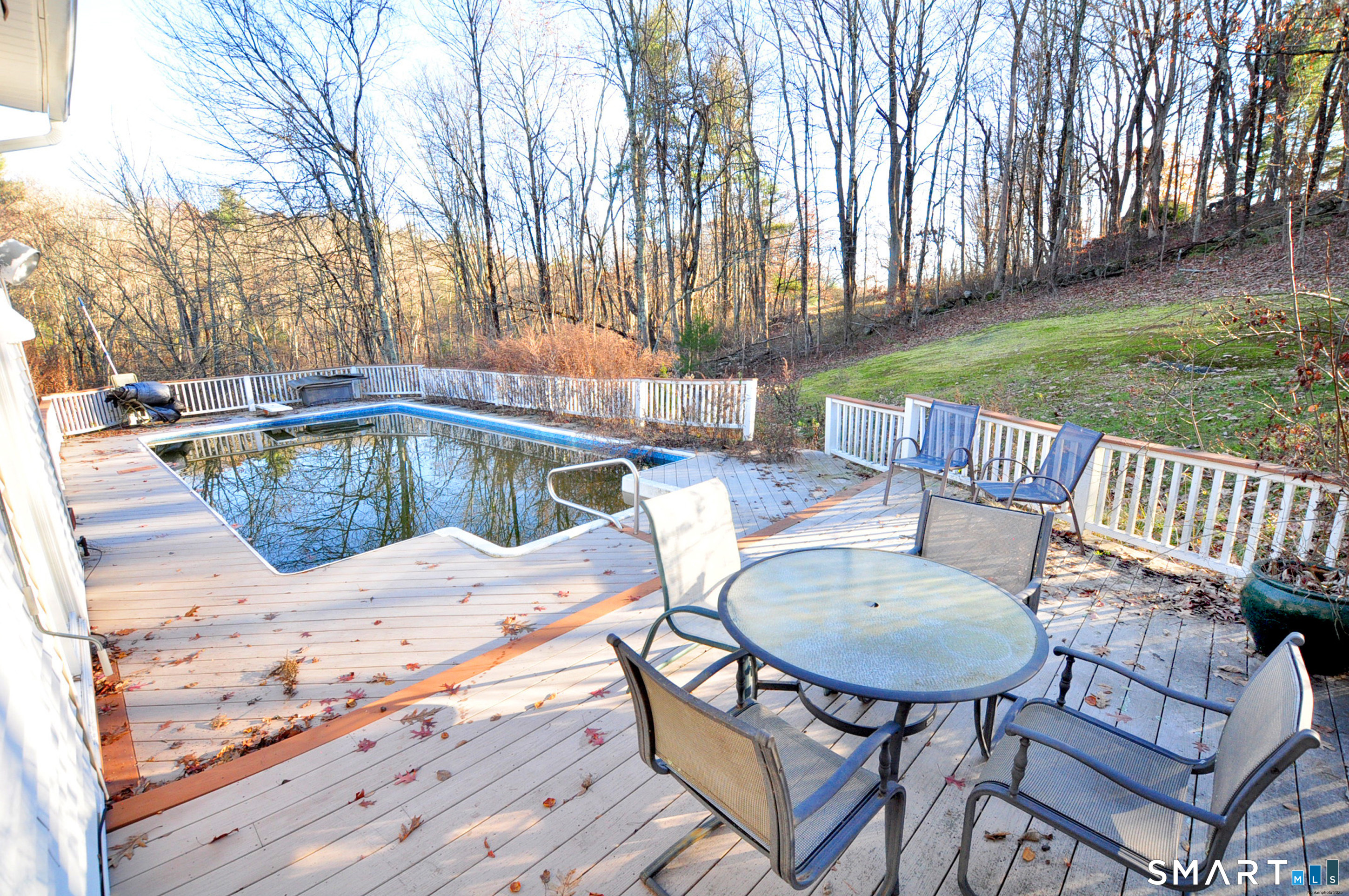 204 Goodhouse Road Litchfield, CT 06759 - Photo 7 of 37 a view of a patio with iron fence