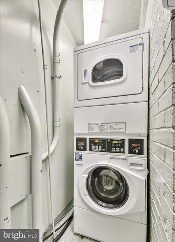 a room with lots of furniture and a window