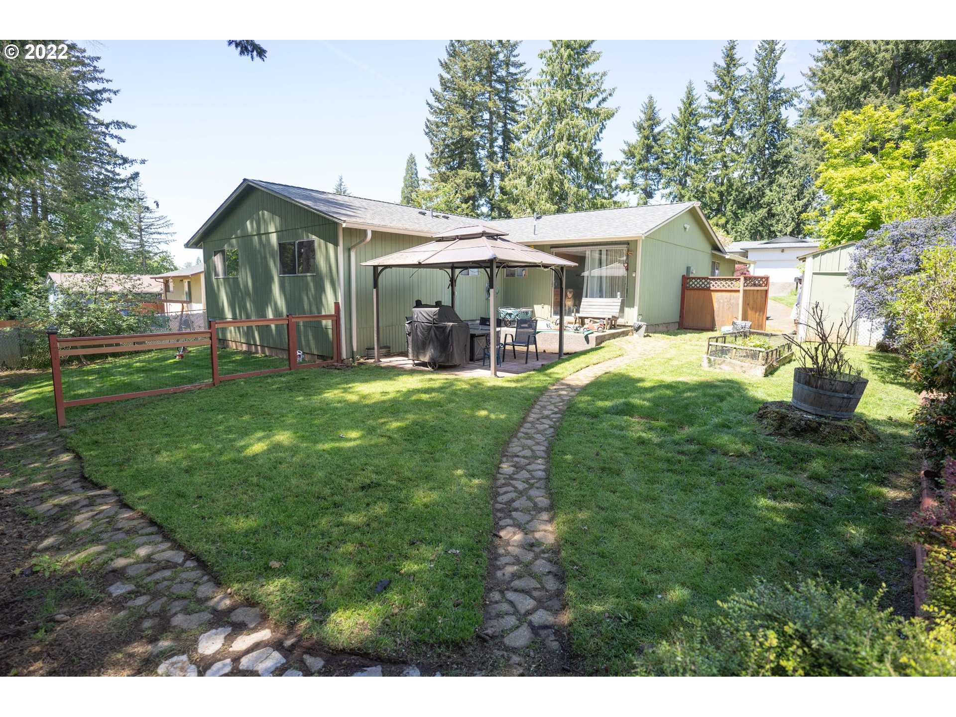 39400 Idleman Street Sandy, OR 97055 - Photo 13 of 15 a view of a house with a yard and sitting area