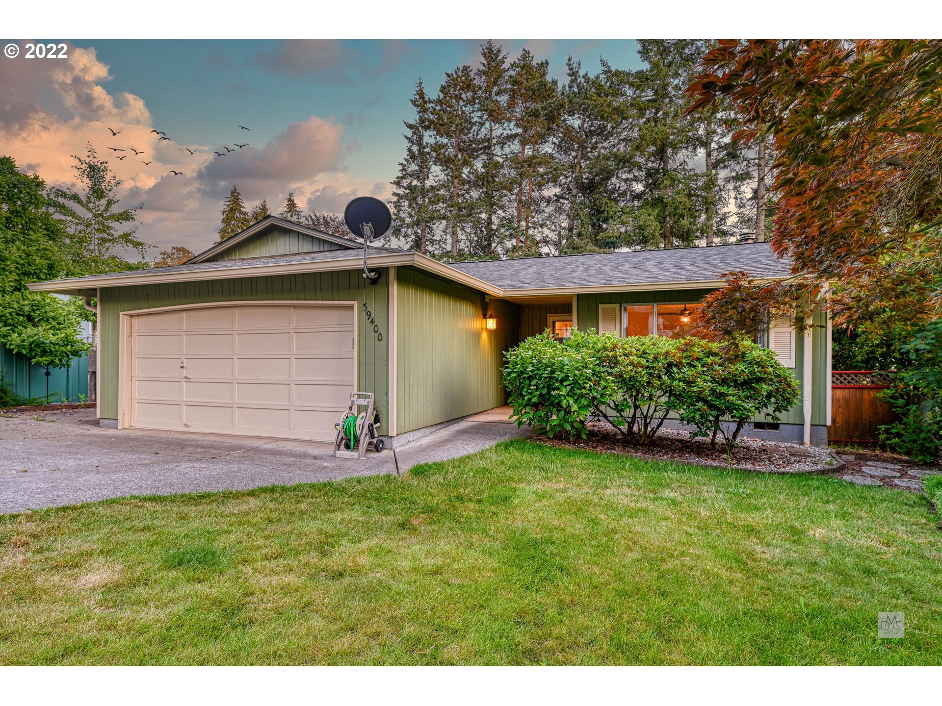 39400 Idleman Street Sandy, OR 97055 - Photo 14 of 15 a view of a backyard with plants and large tree