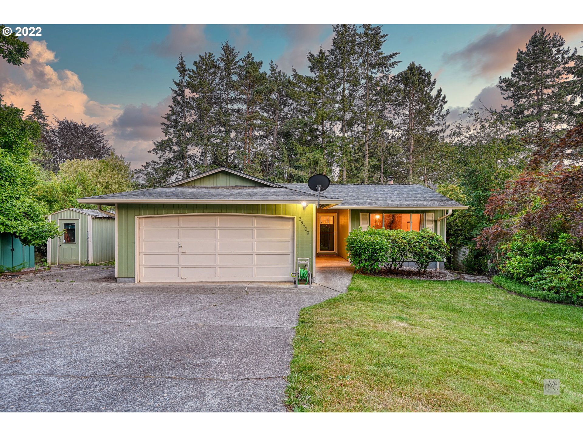 39400 Idleman Street Sandy, OR 97055 - Photo 15 of 15 a front view of a house with a yard and garage