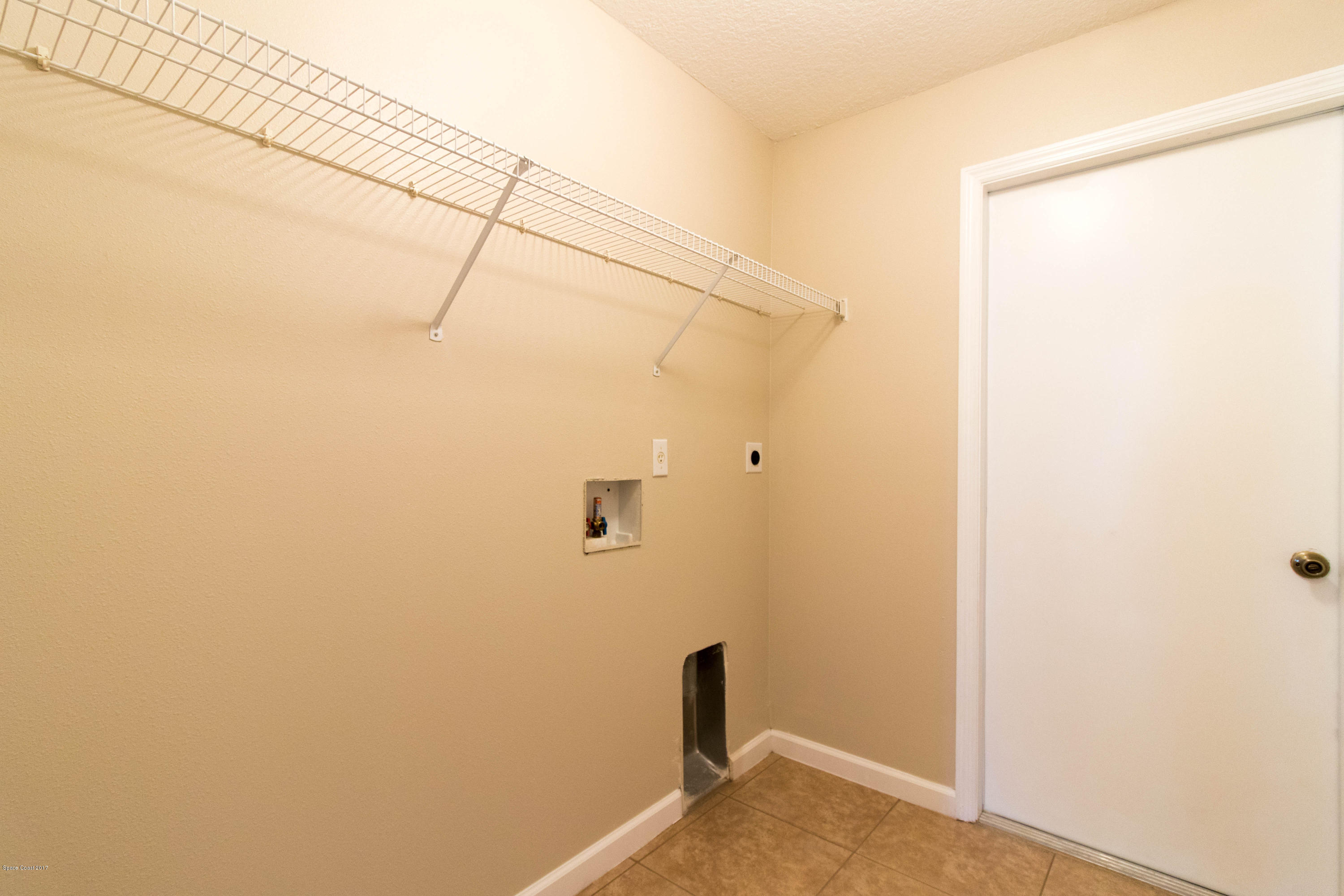 515 Nackman Road Northwest Palm Bay, FL 32907 - Photo 15 of 16 Laundry Room