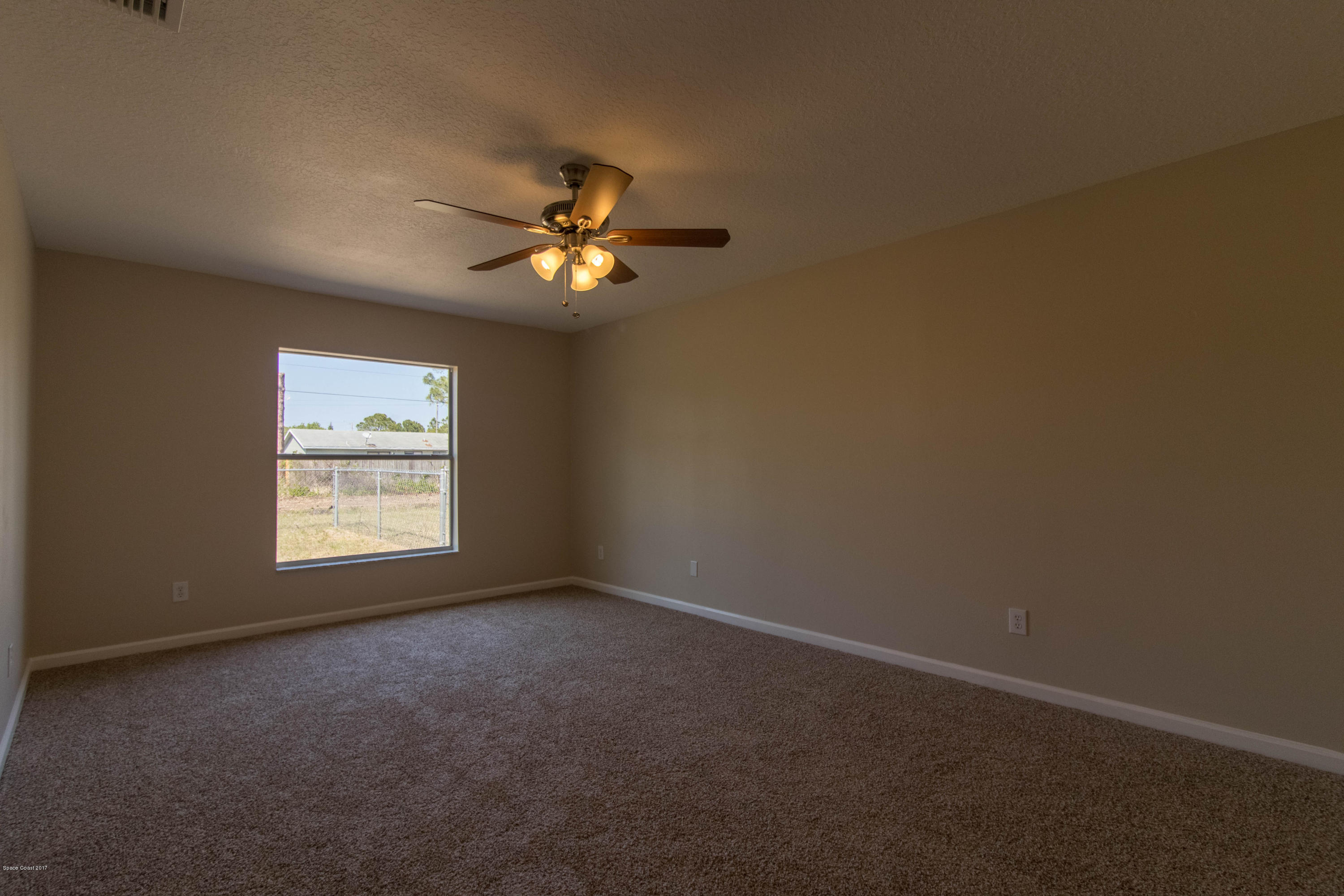 515 Nackman Road Northwest Palm Bay, FL 32907 - Photo 9 of 16 Master Bedroom