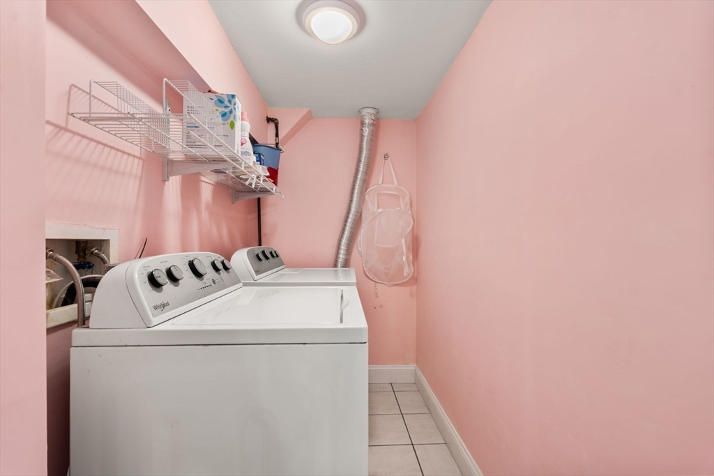 39 Lothrop Street, Unit 1 Boston, MA 02135 - Photo 19 of 19 a utility room with dryer and washer