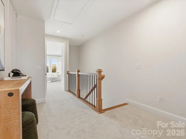 a view of a hallway with workspace