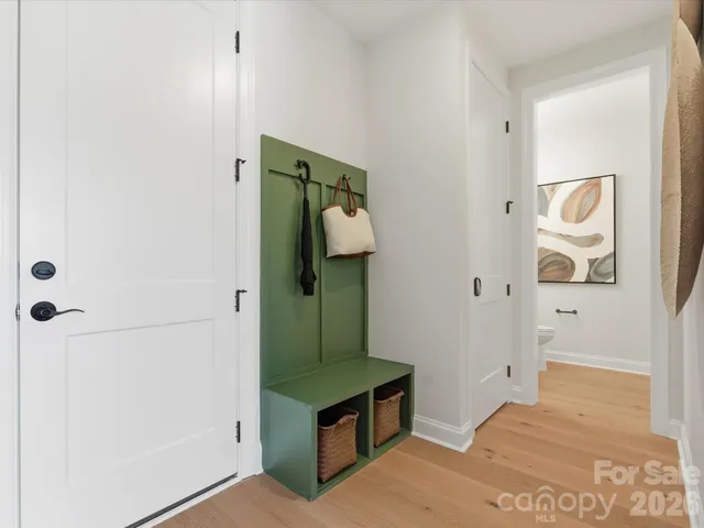 a room with painting and a table