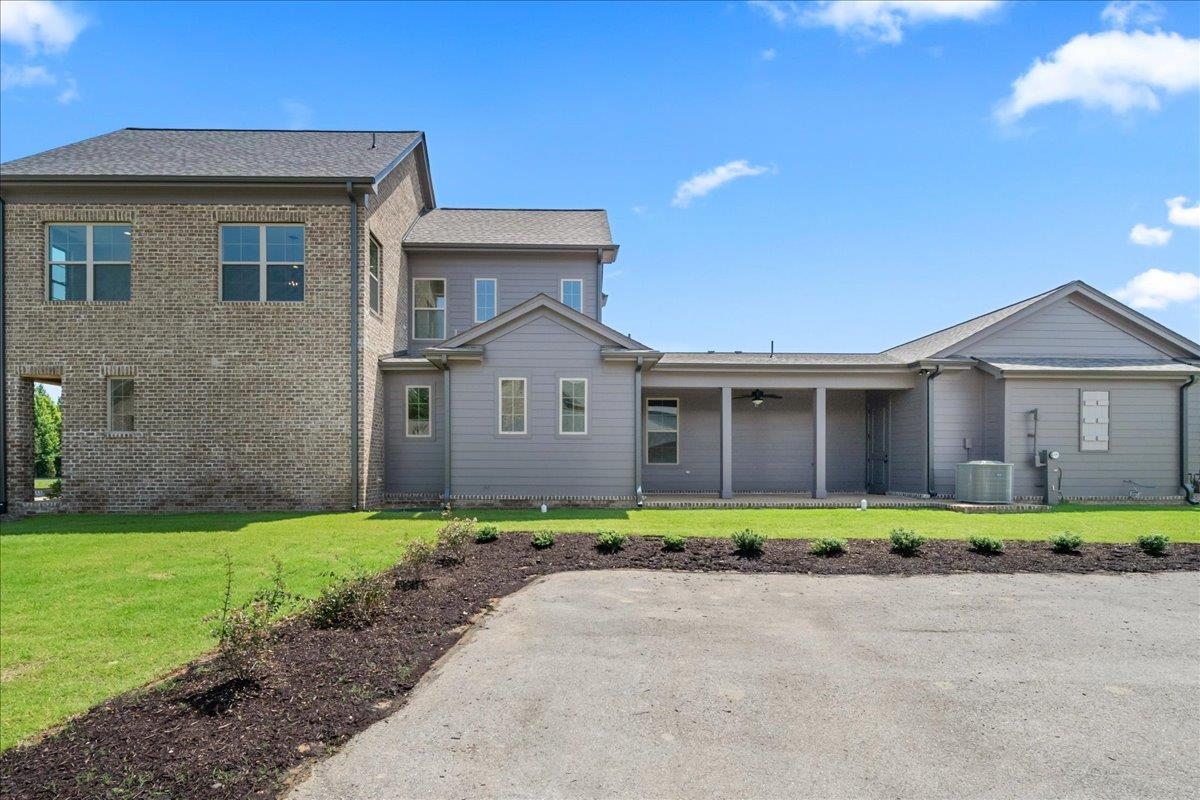 467 Armel Drive Collierville, TN 38017 - Photo 24 of 37 a front view of a house with a yard and garage