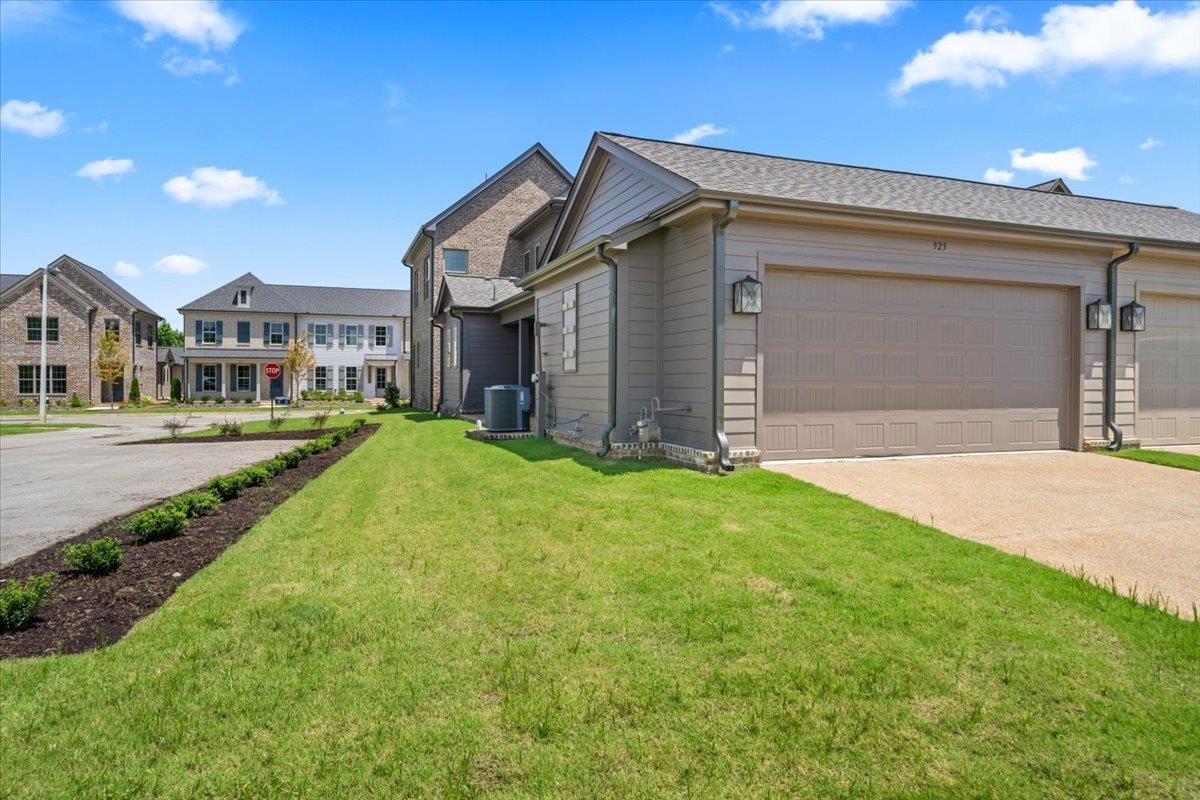 467 Armel Drive Collierville, TN 38017 - Photo 25 of 37 a front view of a house with a yard