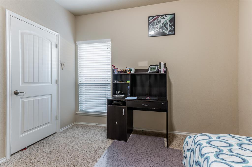 504 Rocky Pine Road McKinney, TX 75072 - Photo 29 of 36 Bedroom featuring baseboards and speckle patterned floor