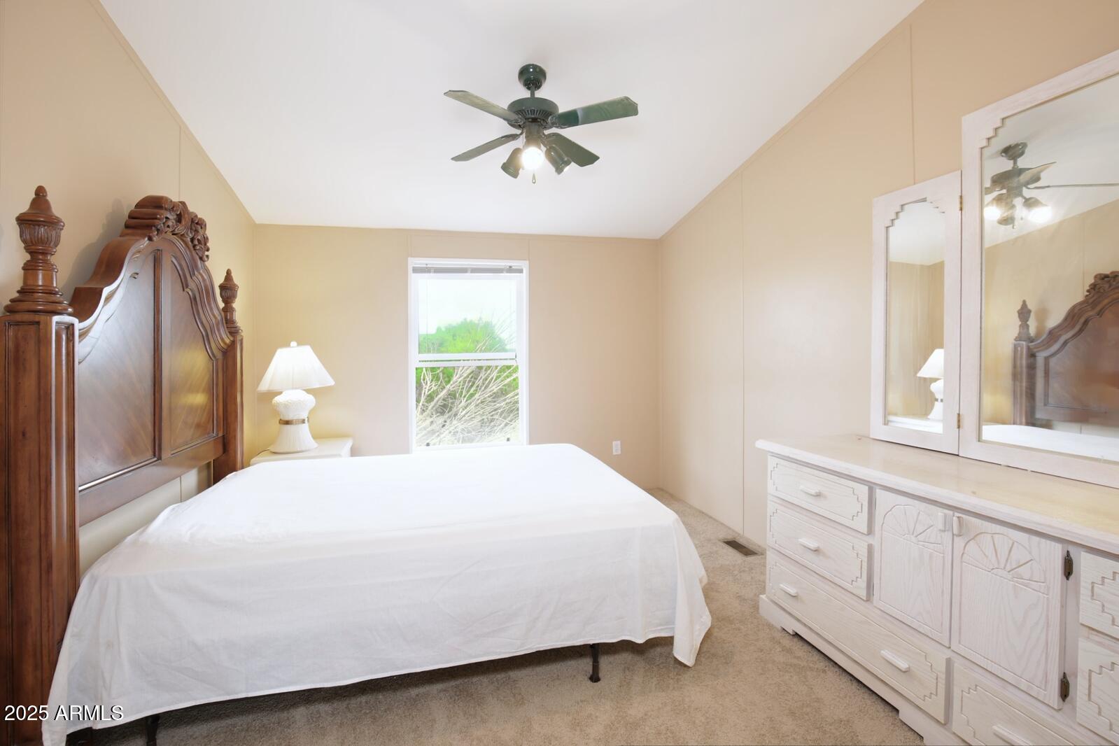 7865 Christmas Tree Road Show Low, AZ 85901 - Photo 18 of 32 a bedroom with a bed and a window