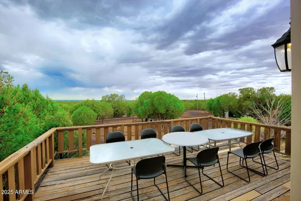 a view of balcony with furniture and stove