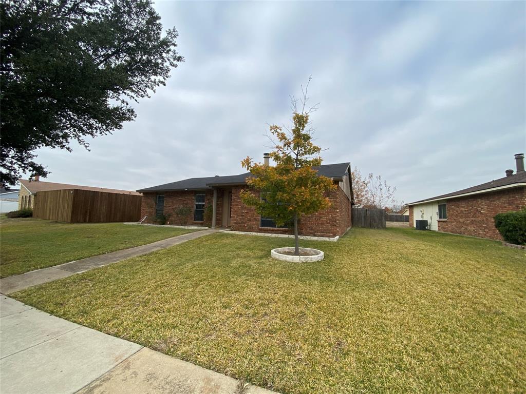 2018 Clark Trail Grand Prairie, TX 75052 - Photo 2 of 40 a backyard of a house