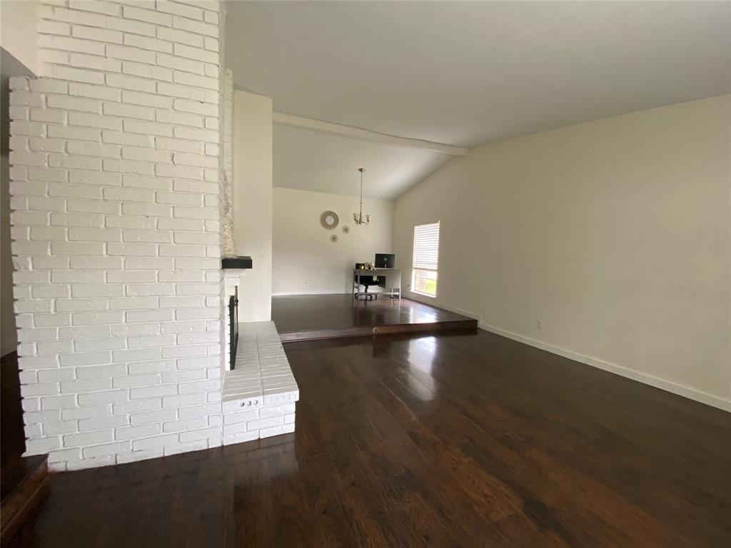 2018 Clark Trail Grand Prairie, TX 75052 - Photo 8 of 40 a view of empty room with wooden floor