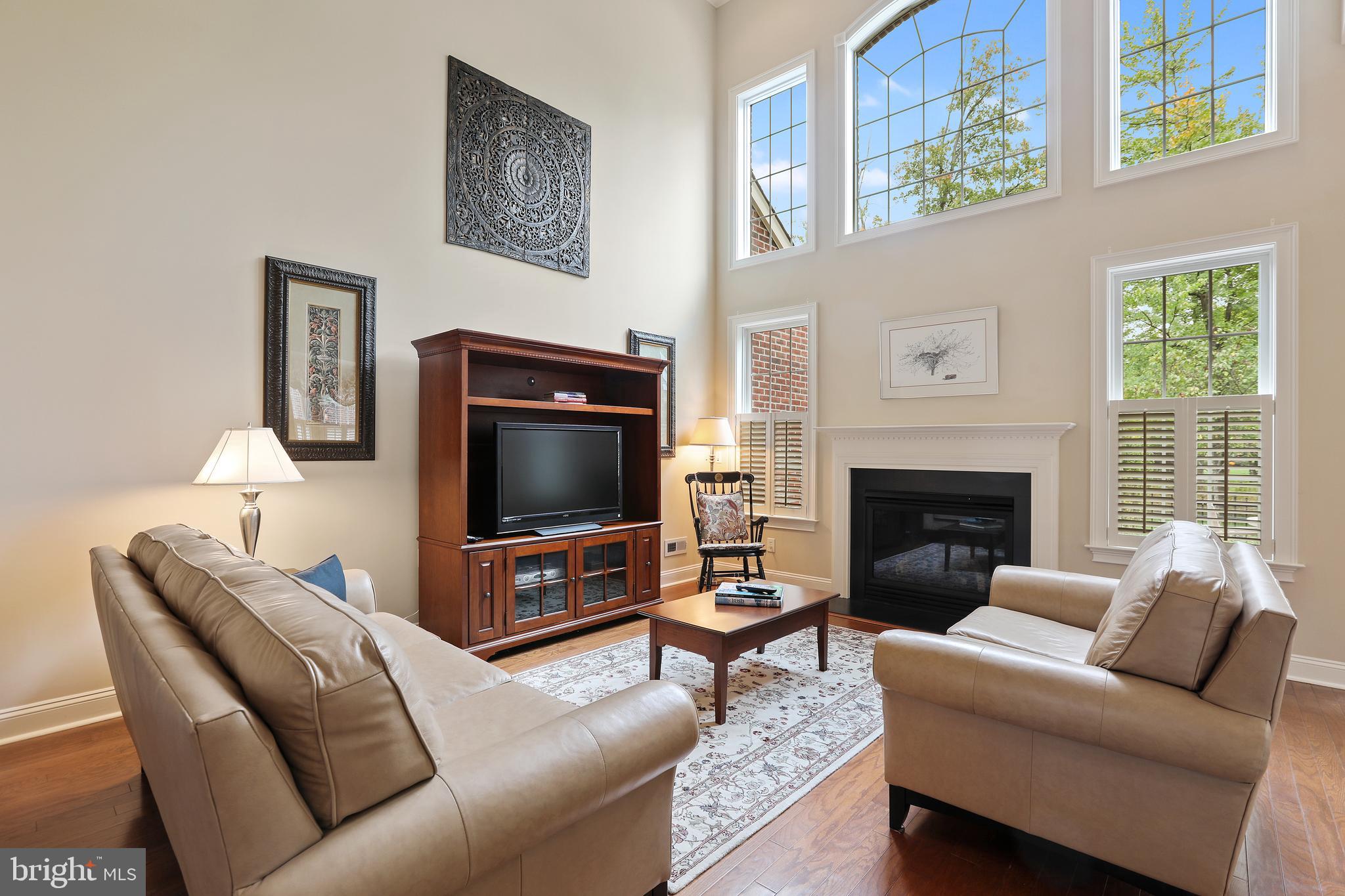 60 Rittenhouse Circle Newtown, PA 18940 - Photo 18 of 39 Sunlit 2-Story Family Room With Gas Fireplace