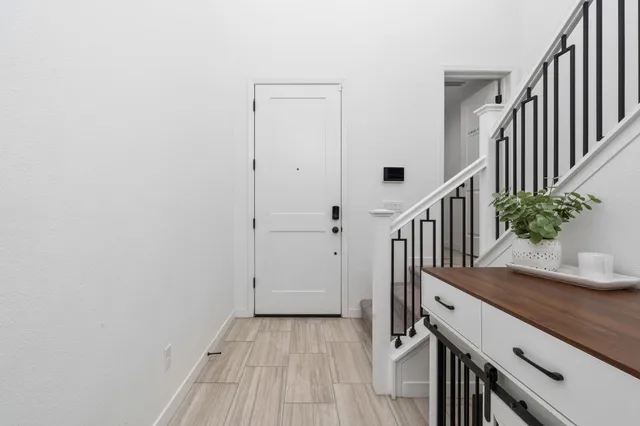a view of entryway with wooden floor