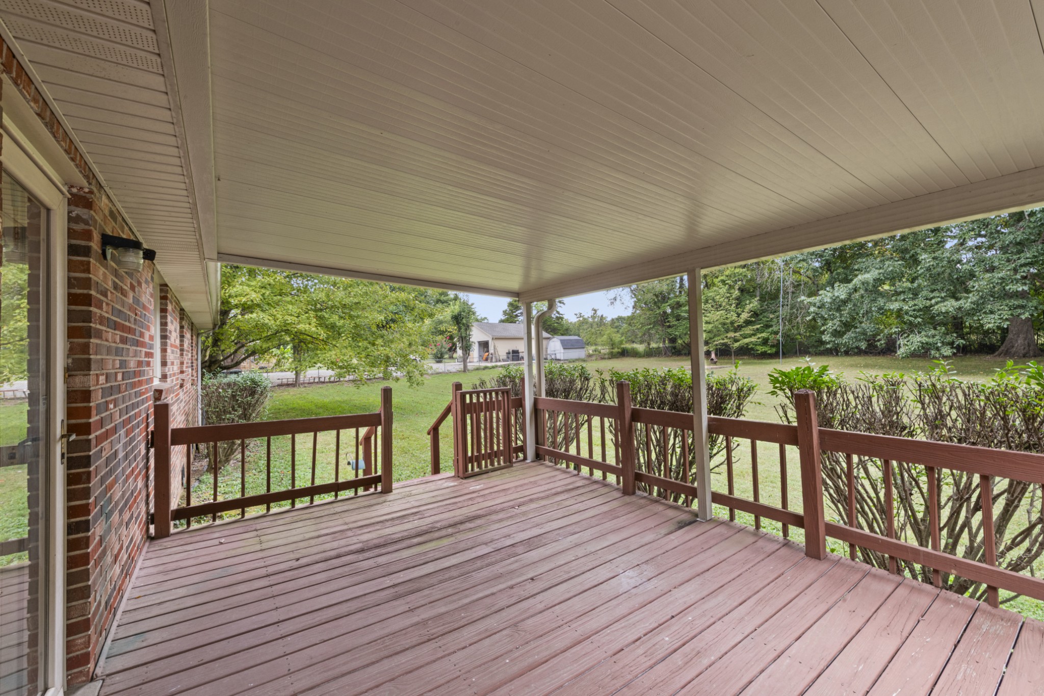 357 Raymond Hodges Road Cottontown, TN 37048 - Photo 17 of 21 a view of a balcony with wooden floor