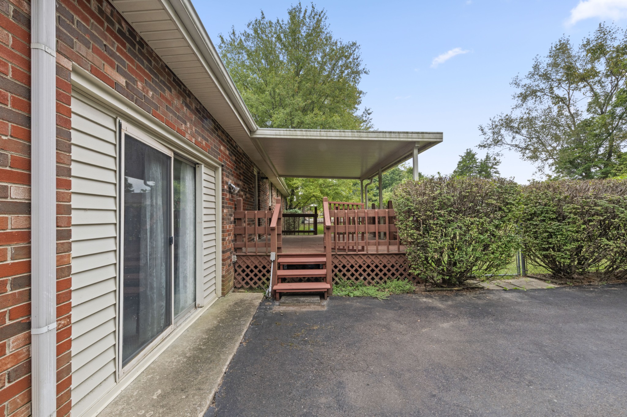 357 Raymond Hodges Road Cottontown, TN 37048 - Photo 18 of 21 a side view of a house with a yard