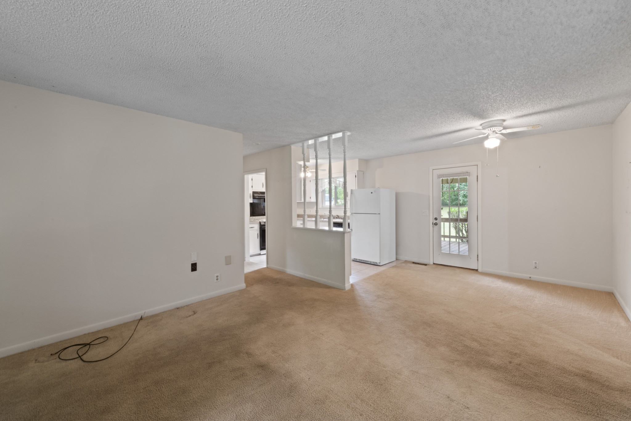 357 Raymond Hodges Road Cottontown, TN 37048 - Photo 6 of 21 an empty room with windows and closet
