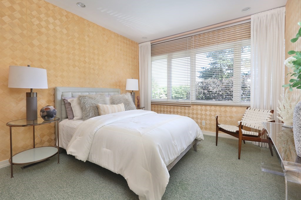 55 Chestnut Hill Road Newton, MA 02467 - Photo 13 of 21 a bedroom with a bed chair and a window