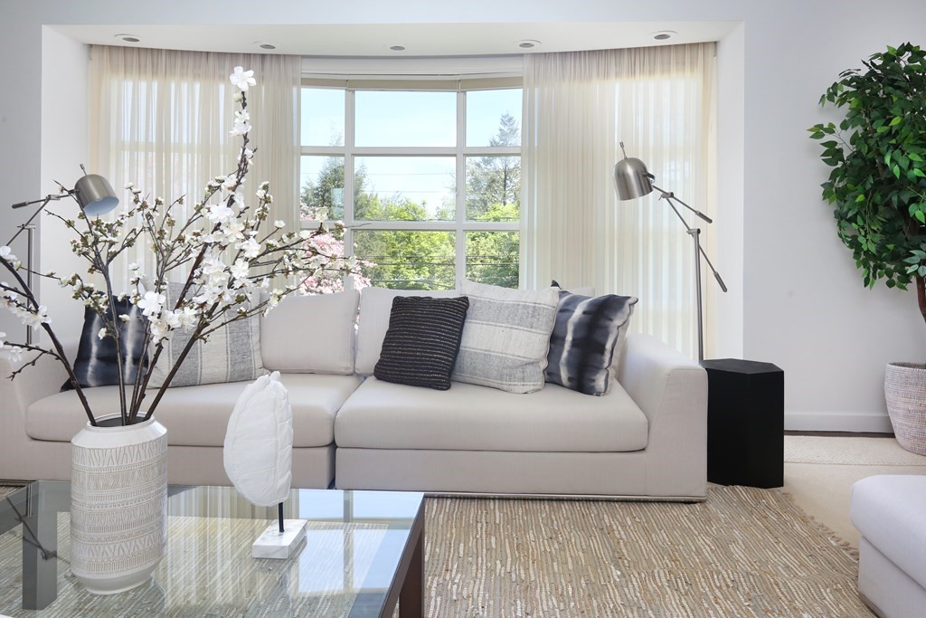 55 Chestnut Hill Road Newton, MA 02467 - Photo 3 of 21 a living room with furniture and a large window