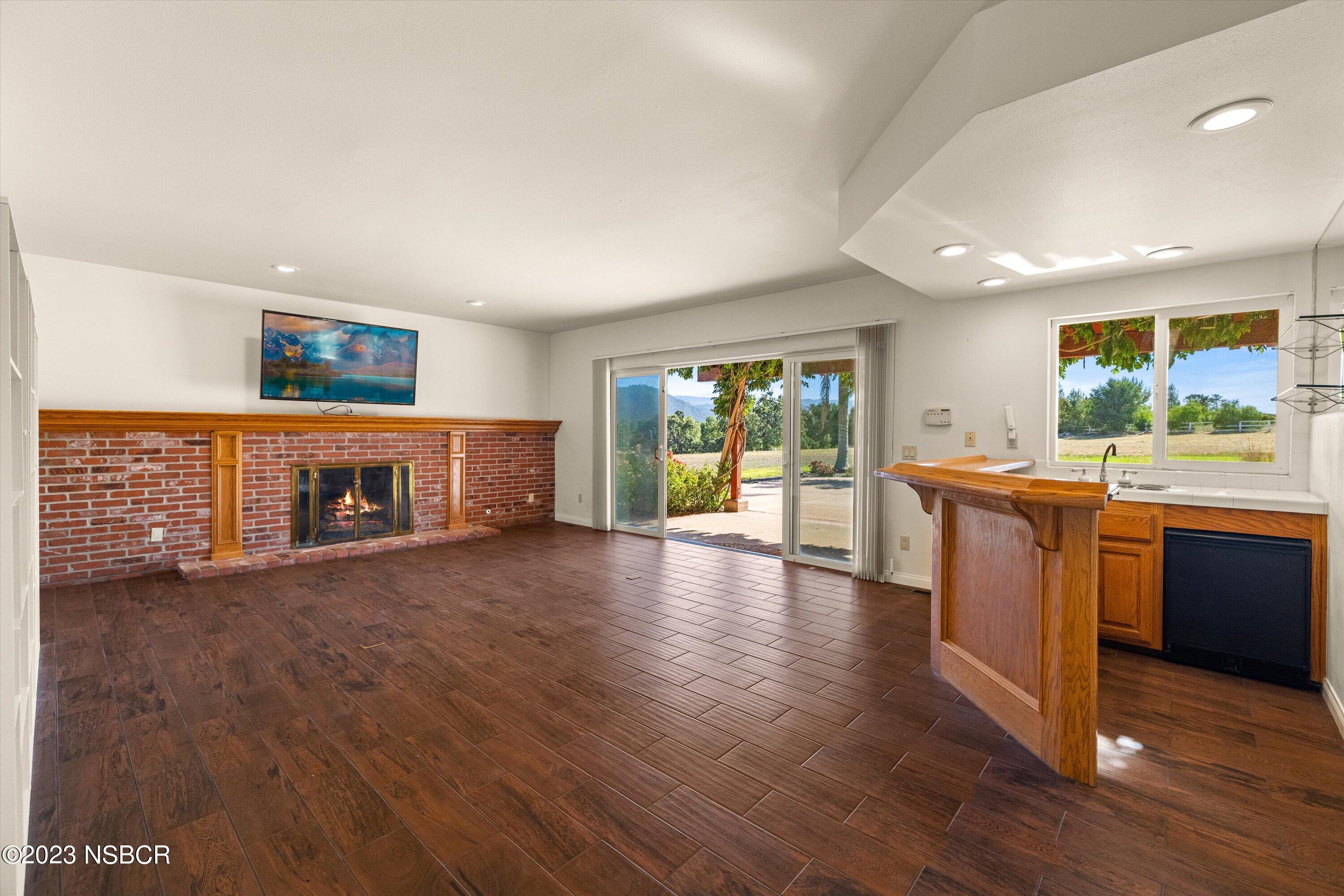 345 Meadowlark Road Santa Ynez, CA 93460 - Photo 11 of 57 a view of a kitchen with a sink and a large window
