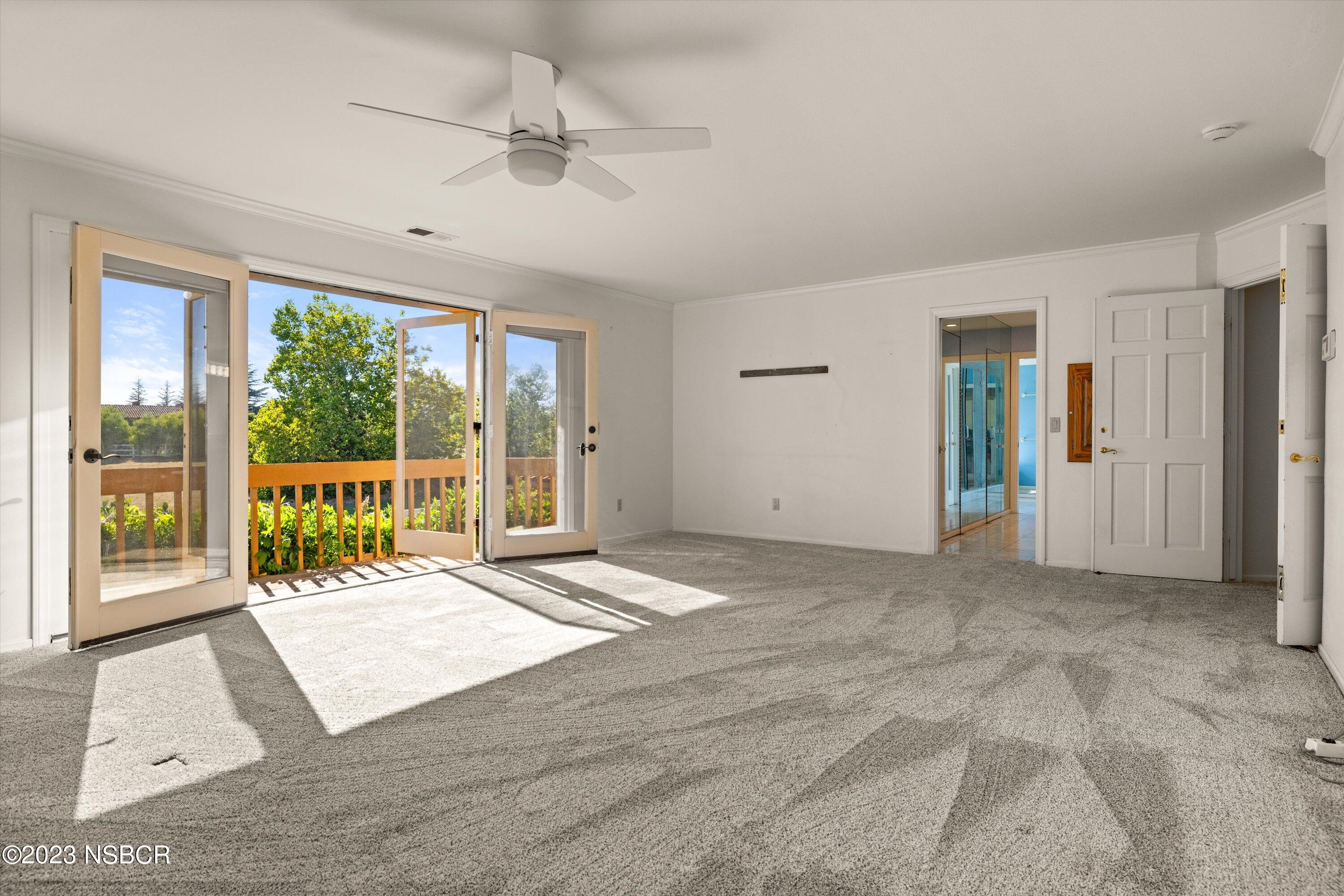 345 Meadowlark Road Santa Ynez, CA 93460 - Photo 21 of 57 a view of an empty room with a balcony