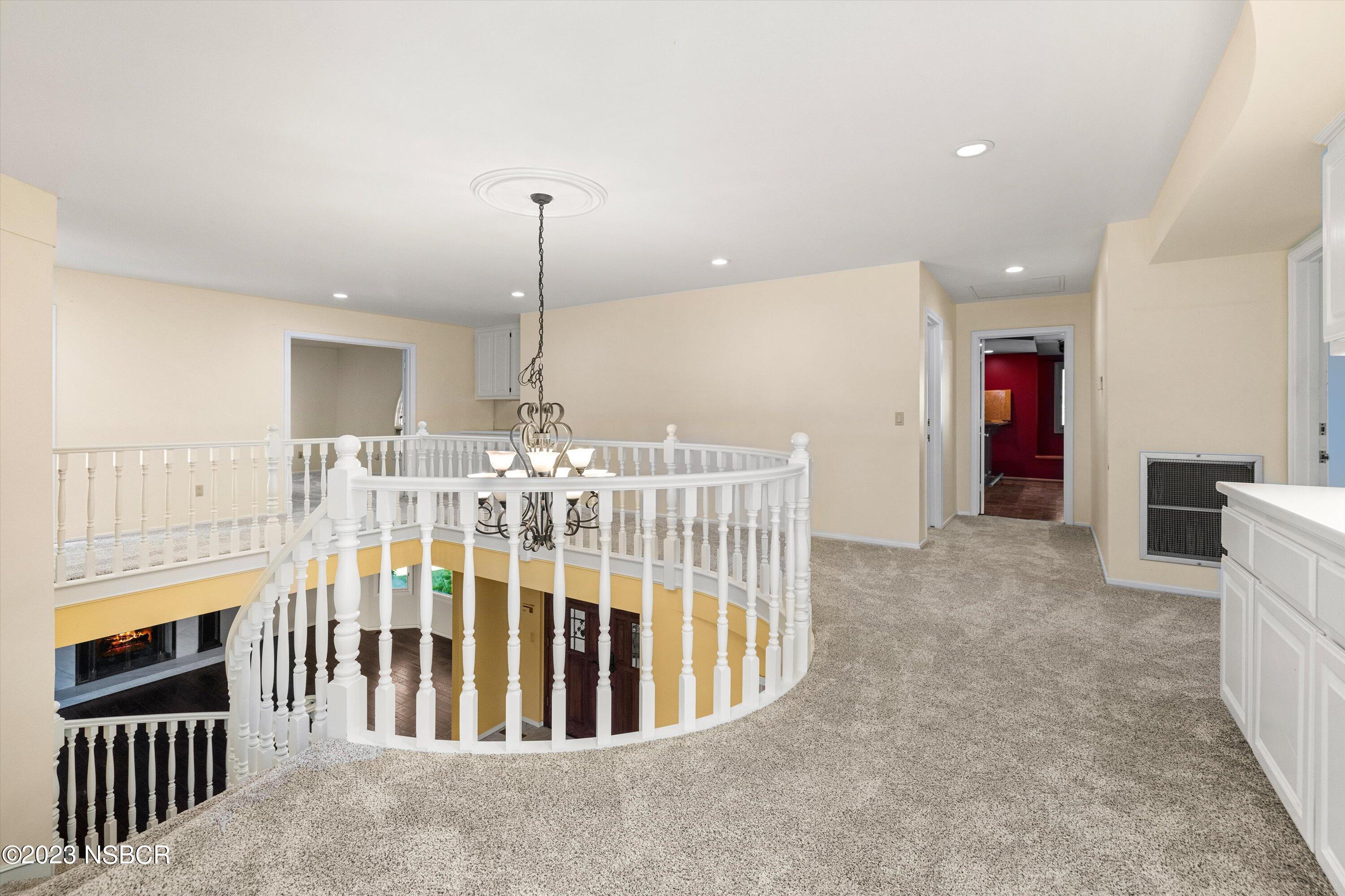 345 Meadowlark Road Santa Ynez, CA 93460 - Photo 26 of 57 a view of a livingroom with furniture an entryway and staircase